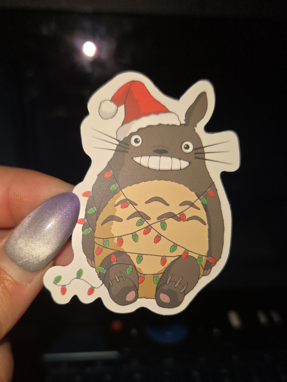Festive Brown Holiday Character Sticker with Red Santa Hat